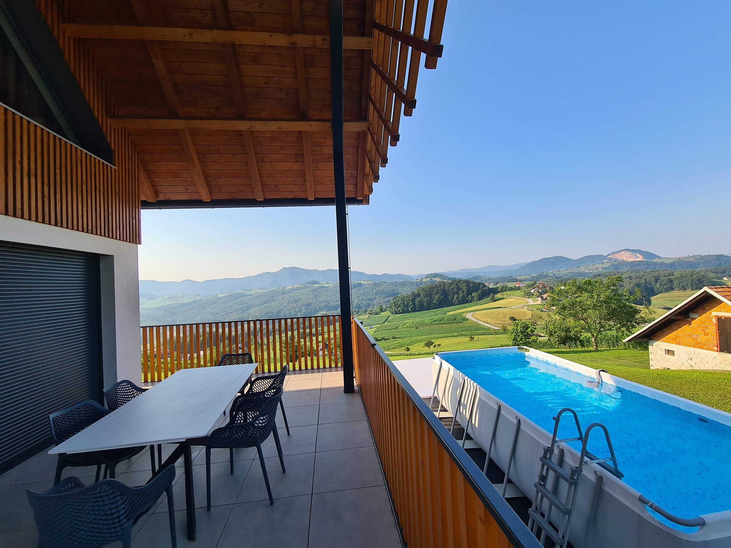 The private outdoor pool on the terrace, with panoramic views over the countryside.
